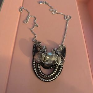 Cool looking necklace. Partially soft suede. NWOT